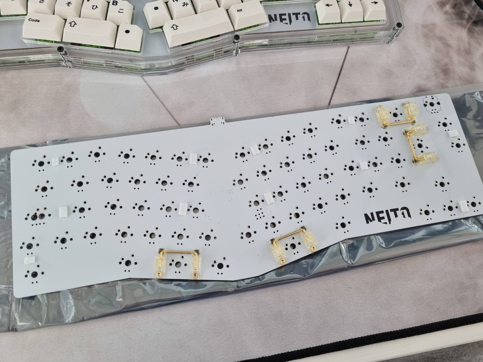 Example of PCB with felt pads and stabilizers installed