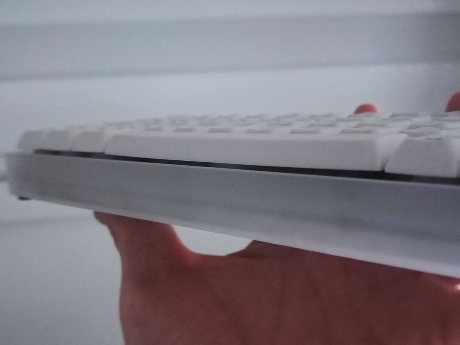 A side profile view of the warped spacebar