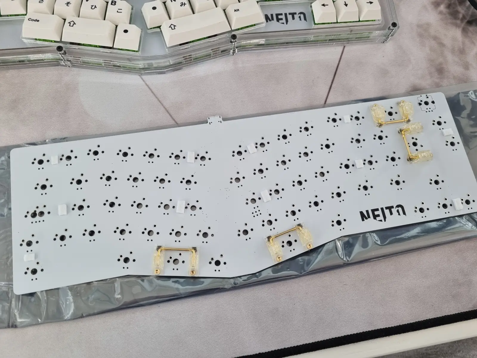 Example of PCB with felt pads and stabilizers installed