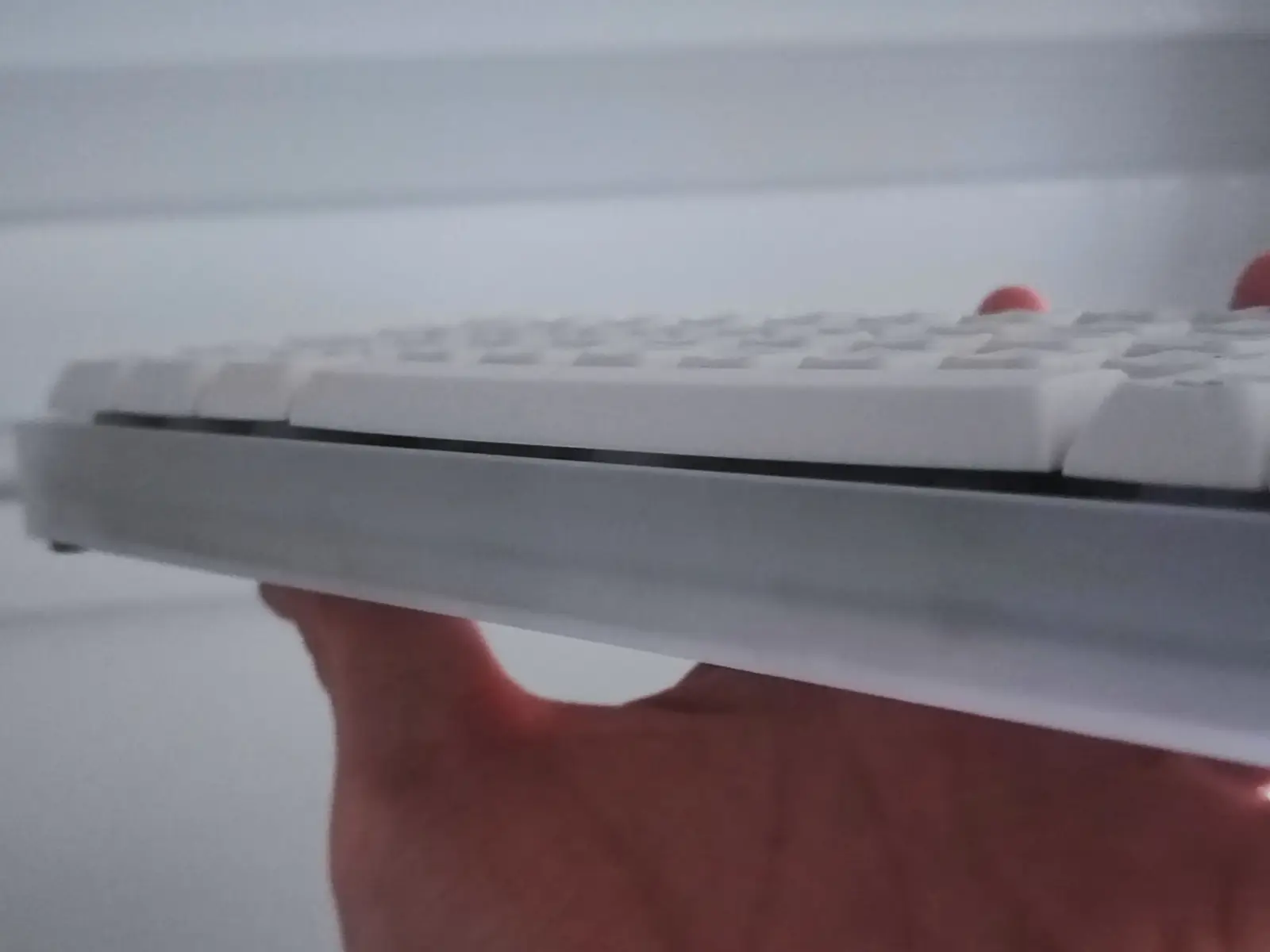 A side profile view of the warped spacebar