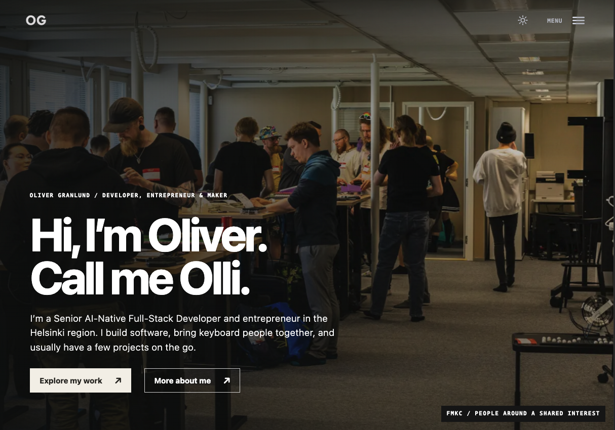 Redesigned olli.works homepage with a keyboard meetup photo, the heading Hi, I'm Oliver. Call me Olli., and two links to explore work and read more