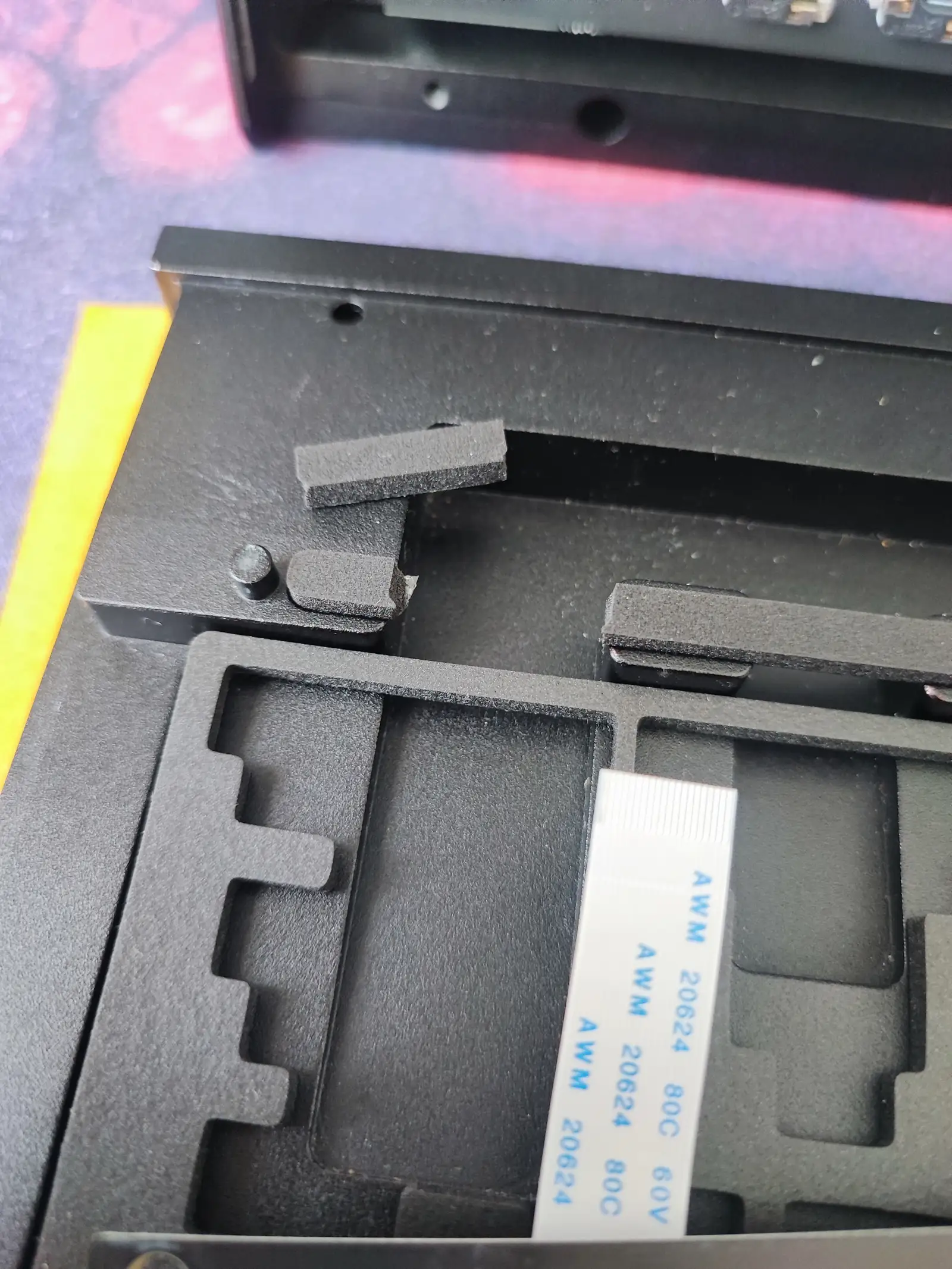 Closeup of some cushioning that required cutting to make the installation bearable