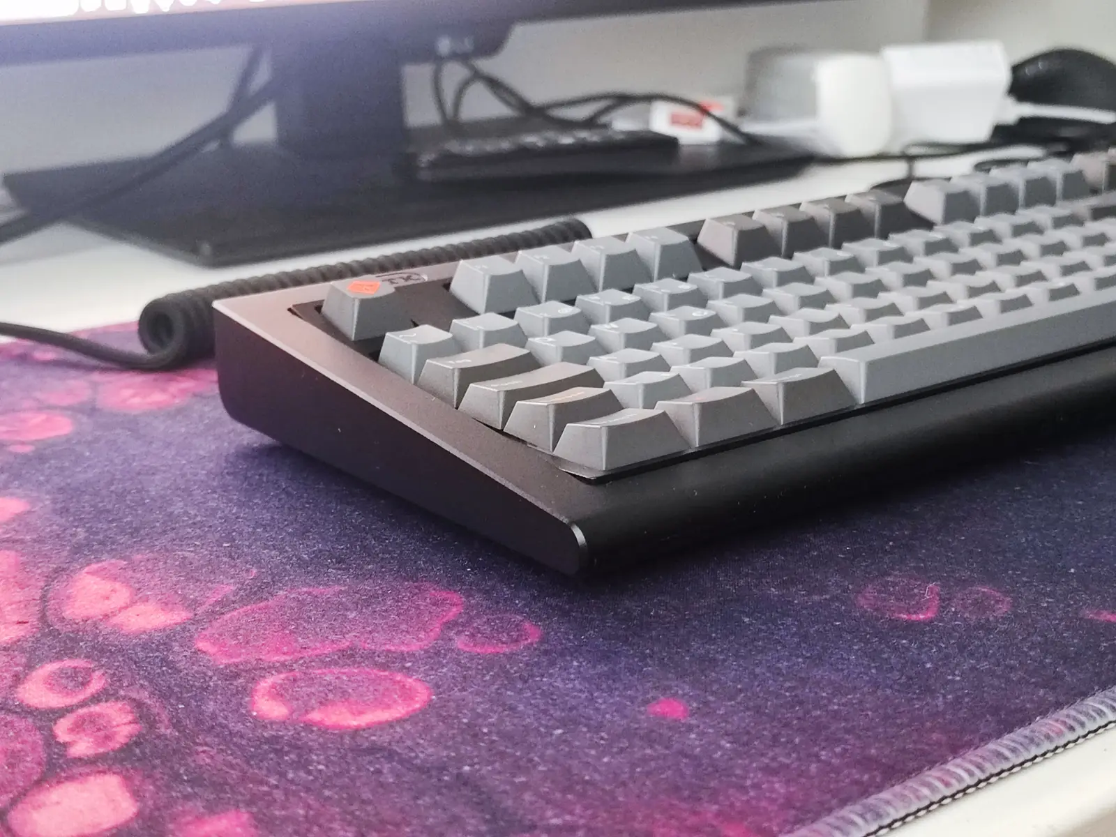 Finished keyboard resting on a huge deskmat