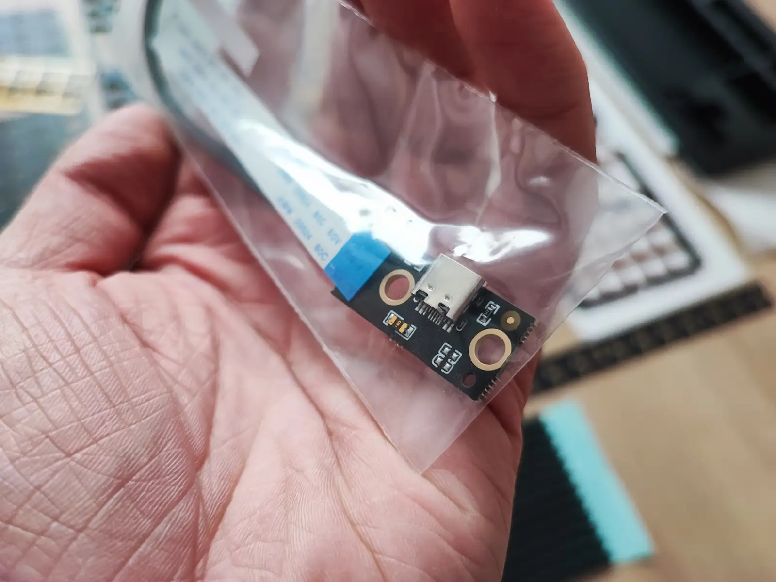Included daughterboard with female Type-C port