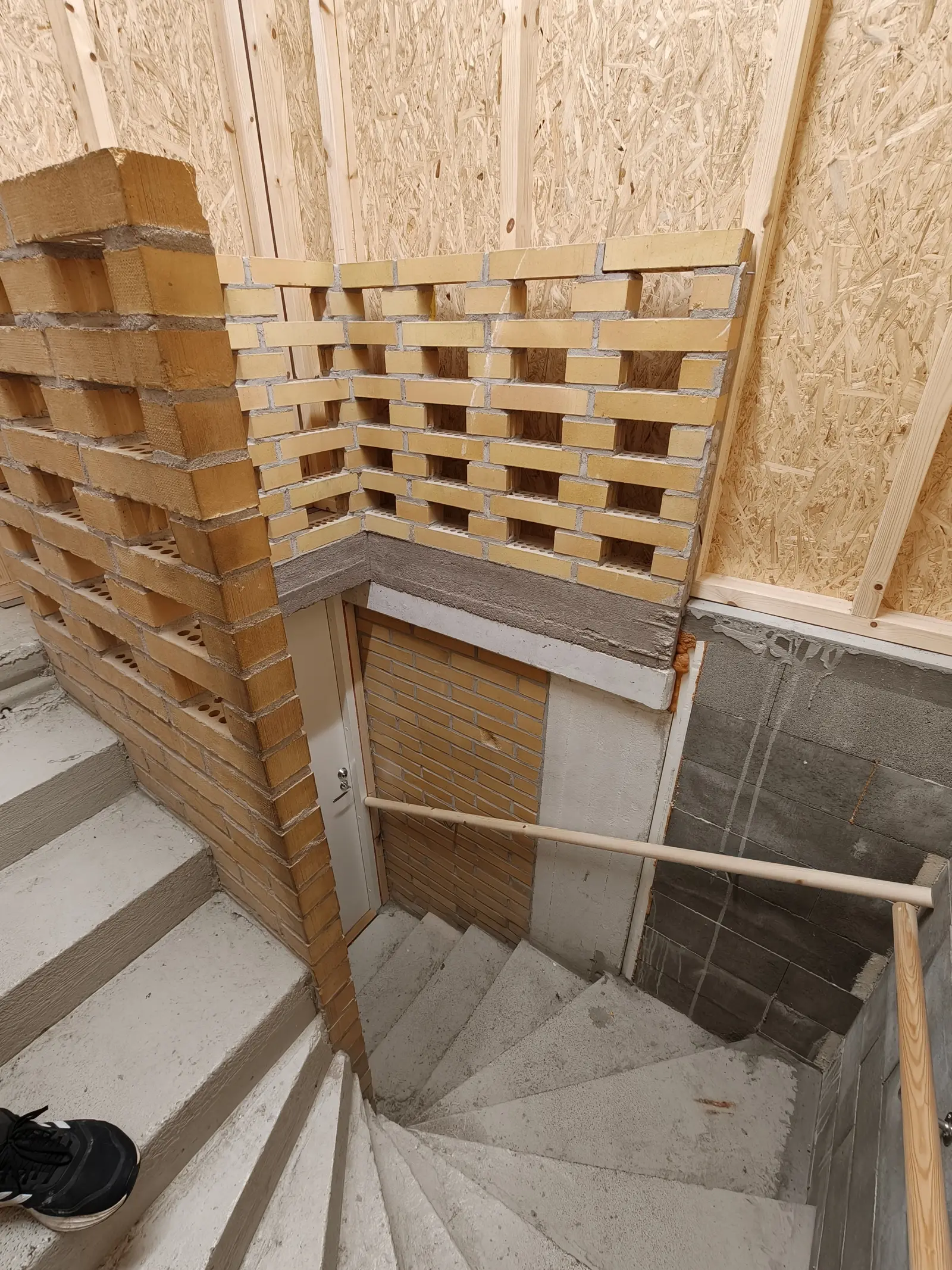 The unfinished stairs leading down to the cask cellar
