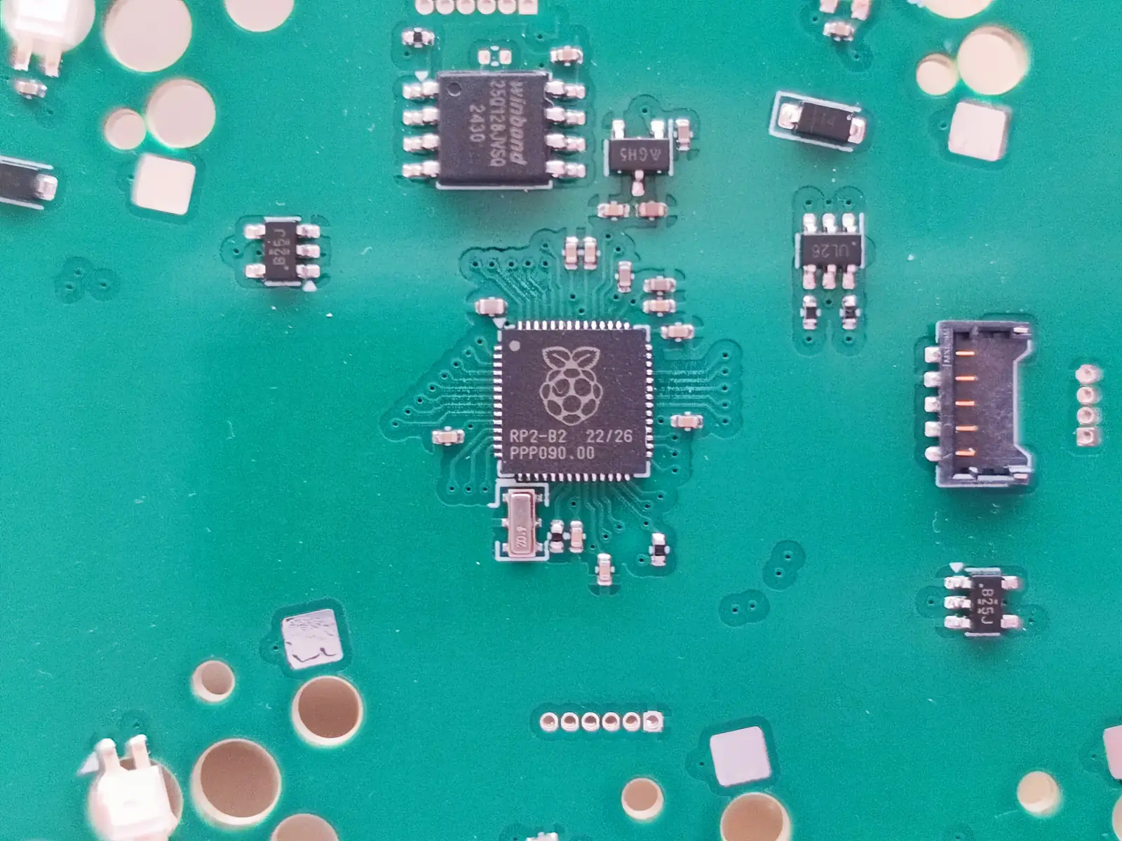 Closeup photo of the RP2040 on a Neito Rev. 2 prototype PCB